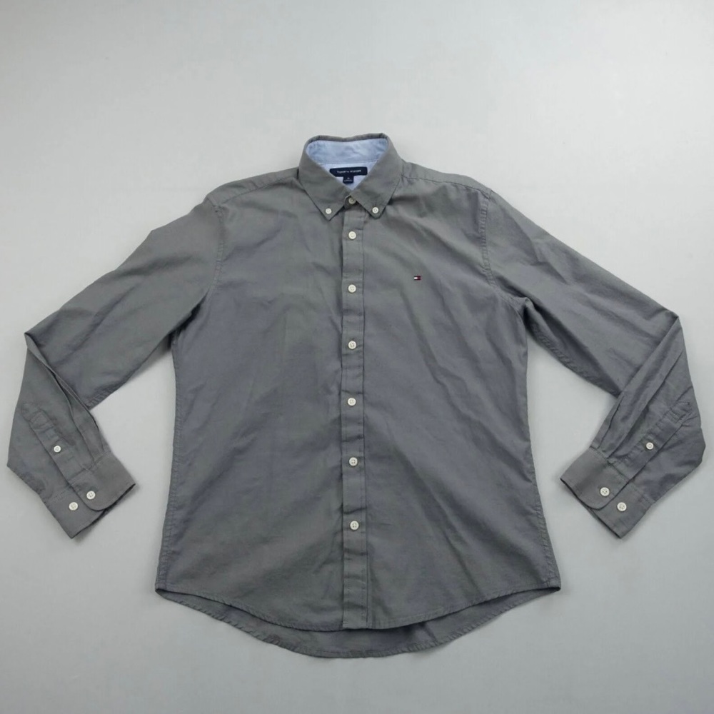 Slim fit medium Tommy teal button down shirt. Size 32/33. Perfect for going out!